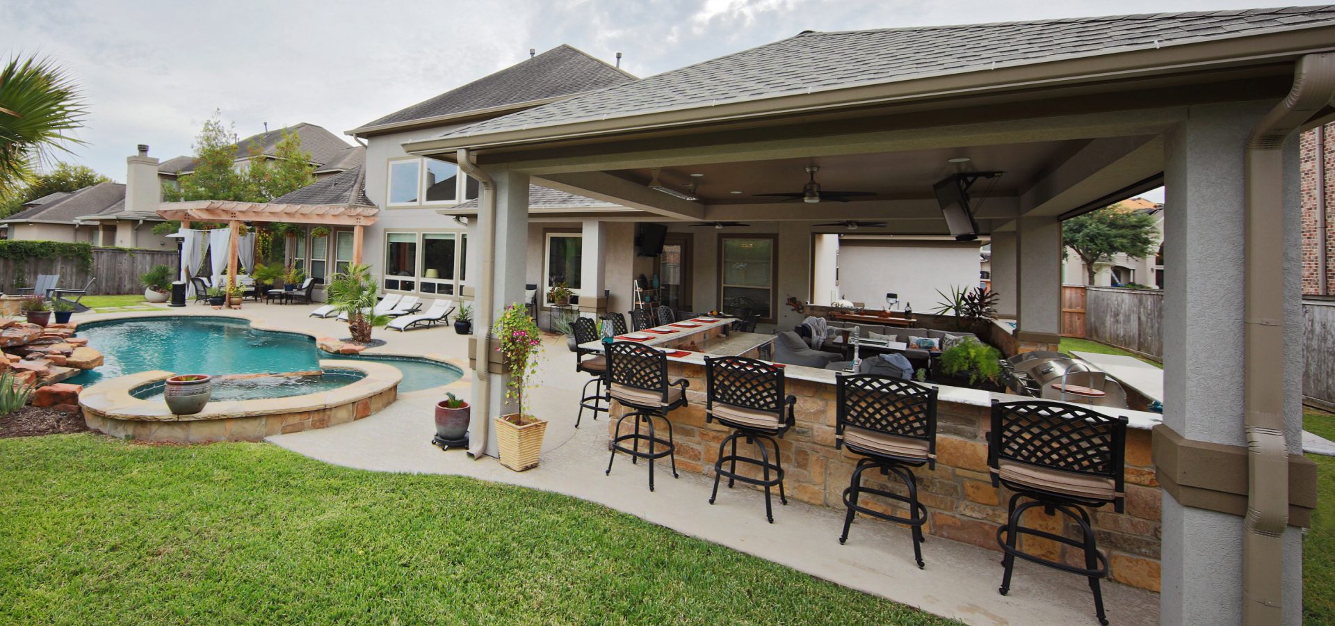 Redesigning and Rebuilding an Ailing Backyard to Create Space for an Outdoor Kitchen